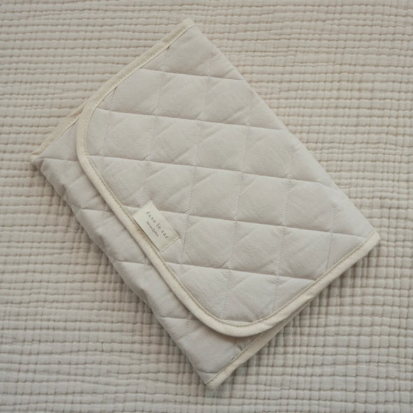 Dans le sac - Tapis de change Crème