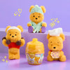 Peluche l'Ourson « Câlins au miel » (capsule surprise) de 14 cm, à collectionner, dans un pot de miel.