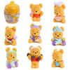 Peluche l'Ourson « Câlins au miel » (capsule surprise) de 14 cm, à collectionner, dans un pot de miel.